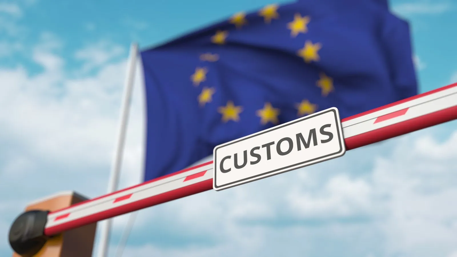 EU-Flagge an einer Zollschranke — Zollabfertigung nach europäischen Normen